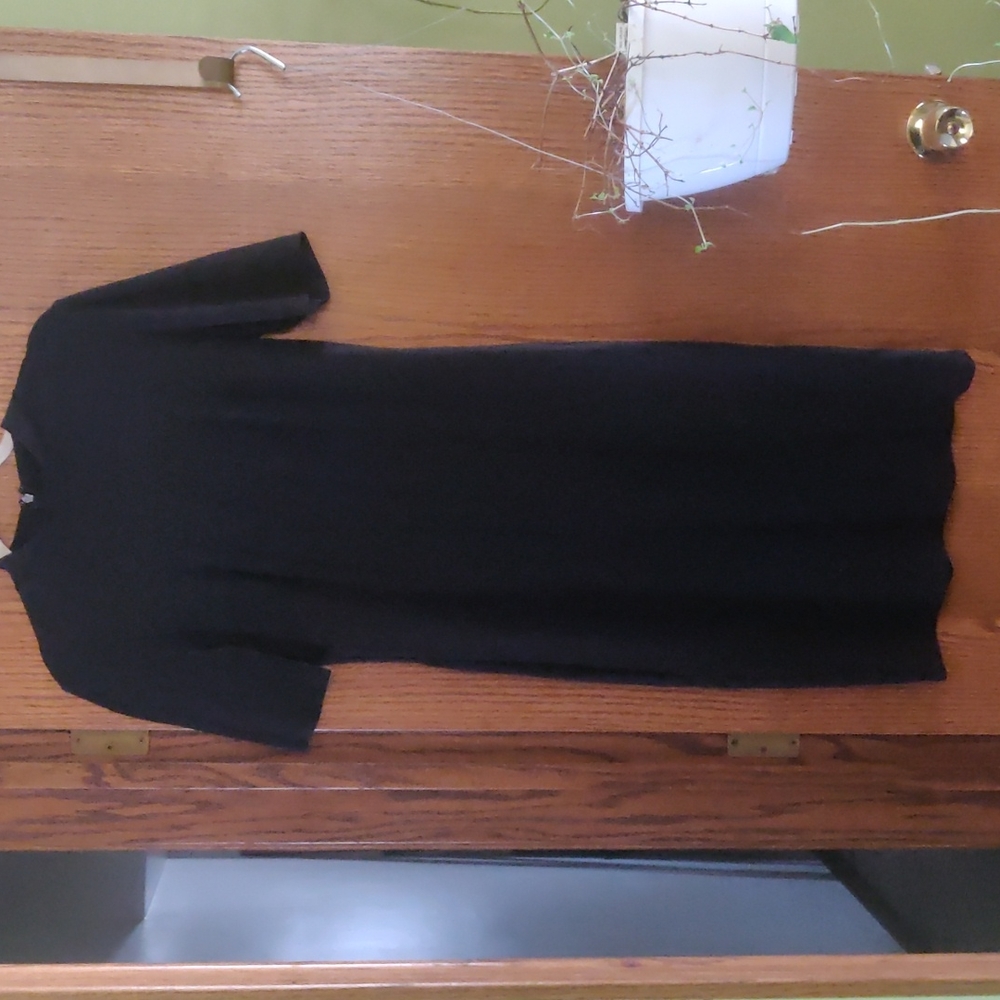 Black knit stretch fitted pencil dress. Zipper back
